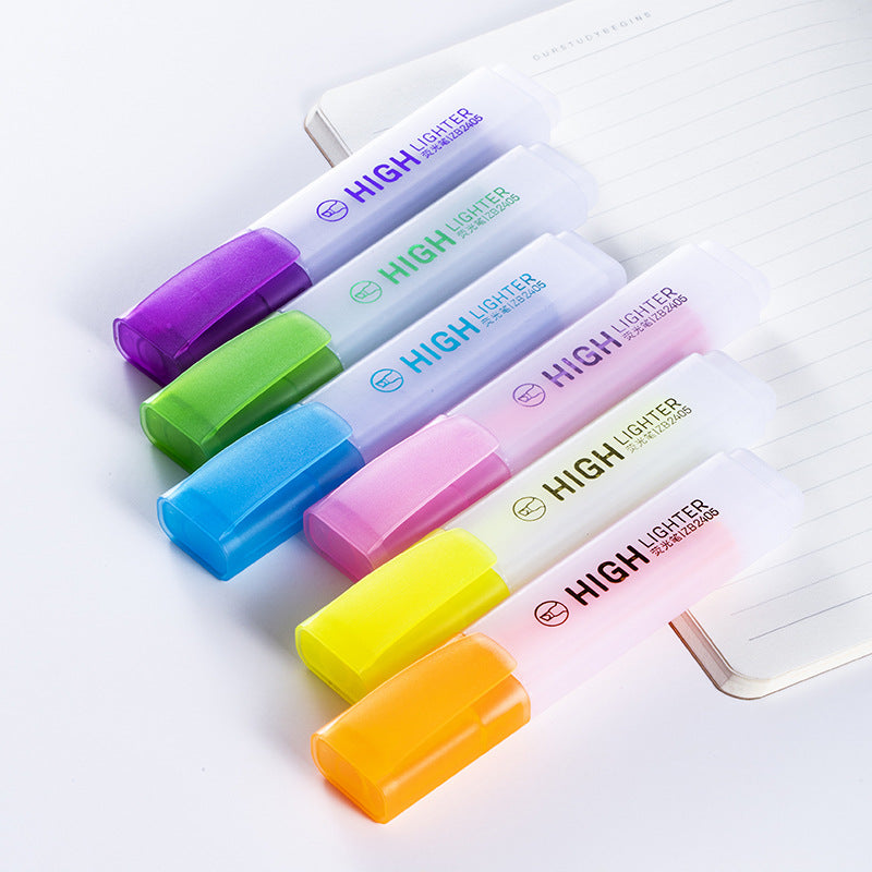 Assorted highlighters with clear caps