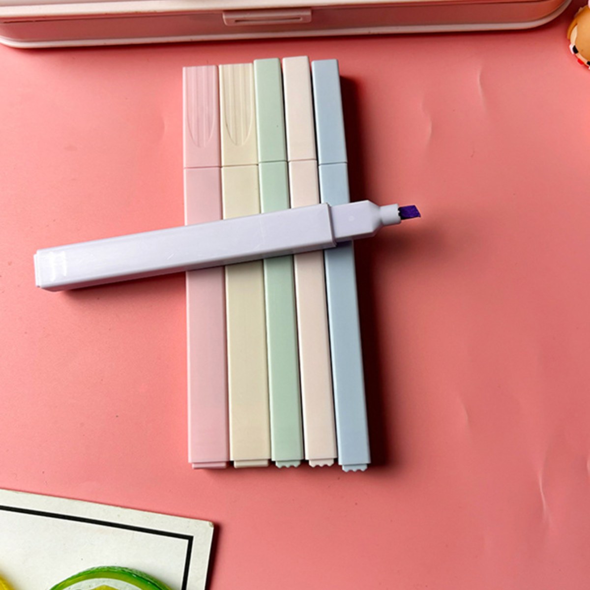 Uncapped highlighter showing the chisel tip